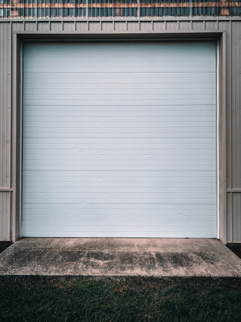 A white, closed garage door