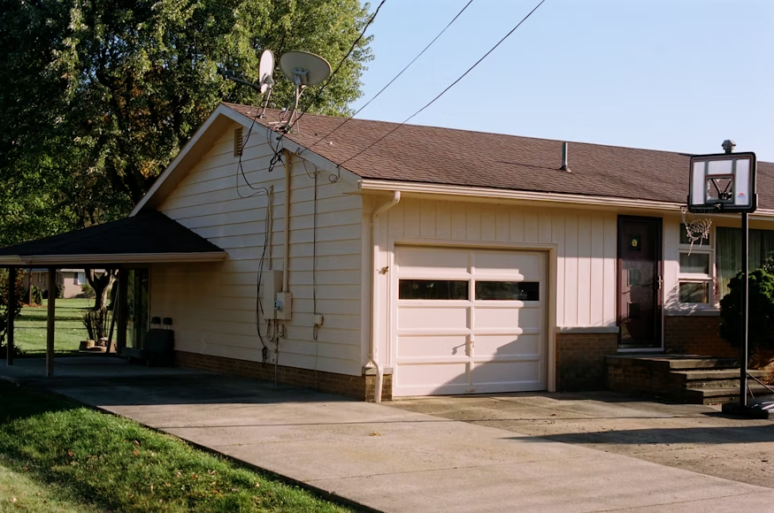 wooden house near green grass field