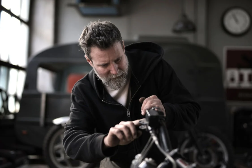 Garage door technician performing maintenance