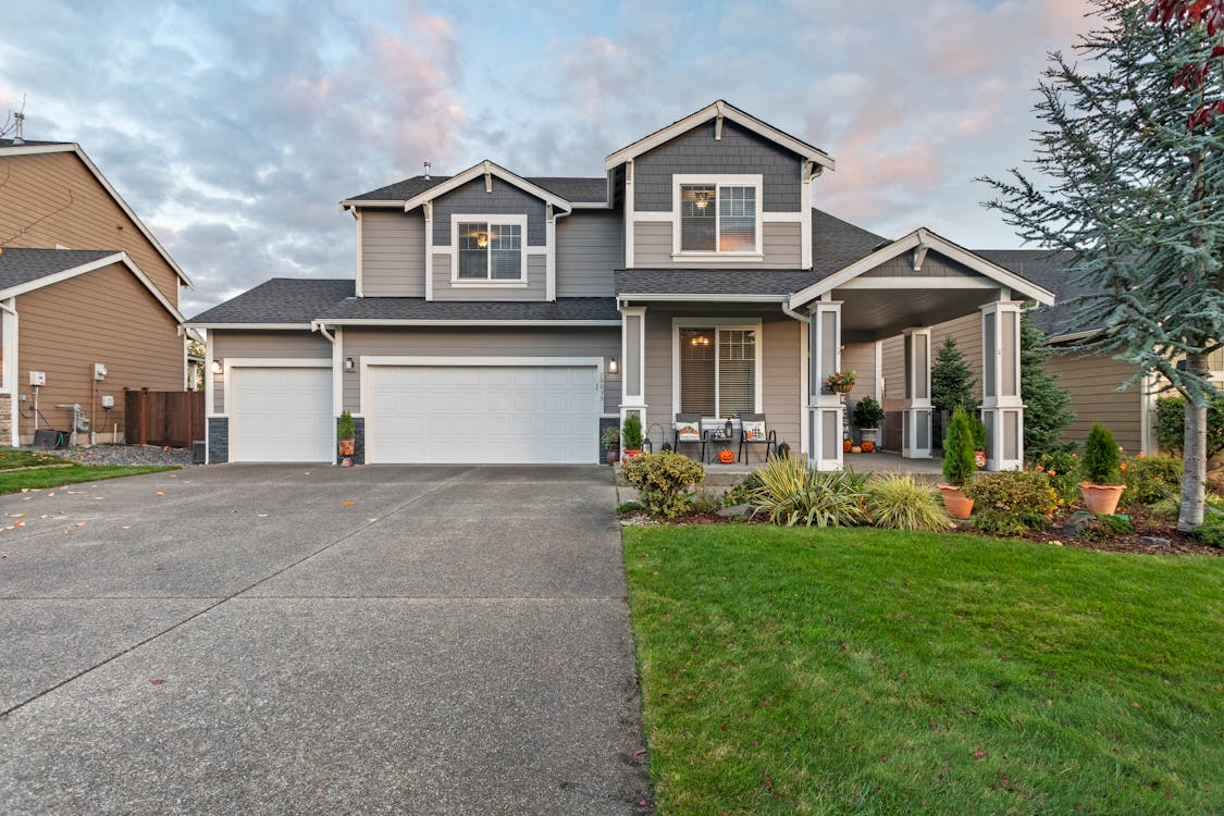  Modern home with sleek garage door and driveway