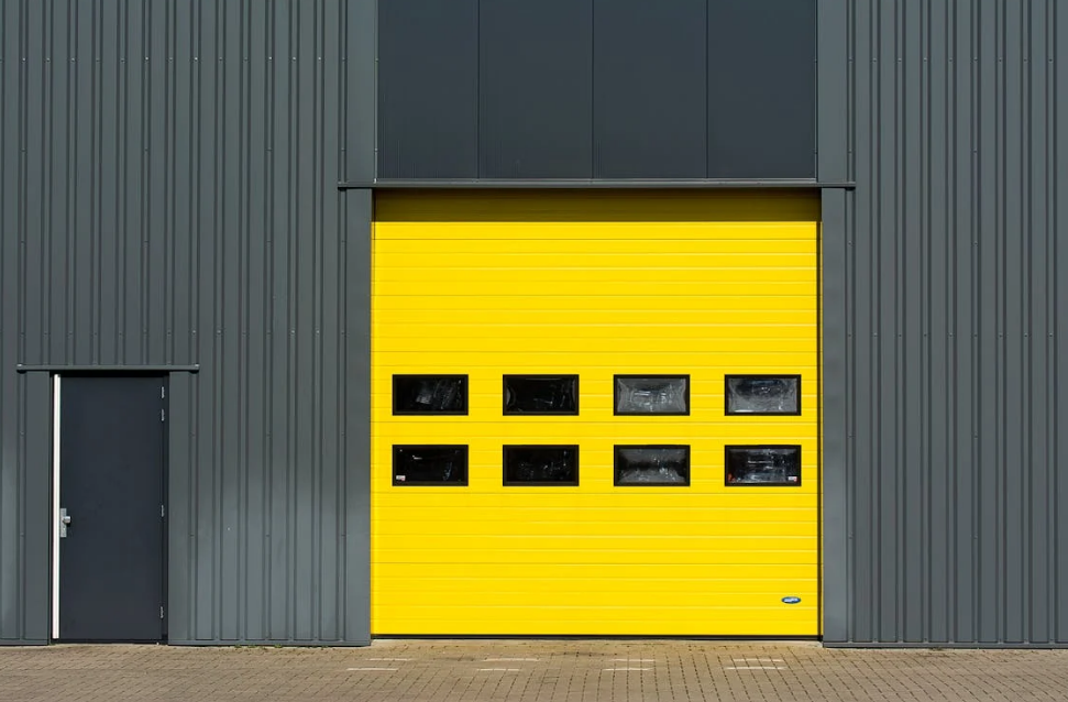 a bright yellow colored garage door